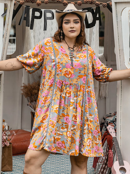 Plus Size Ruched Printed Half Sleeve Mini Dress